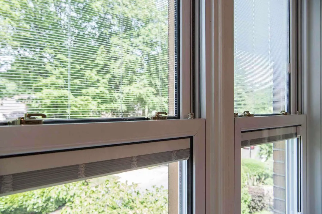Integral blinds for sash windows