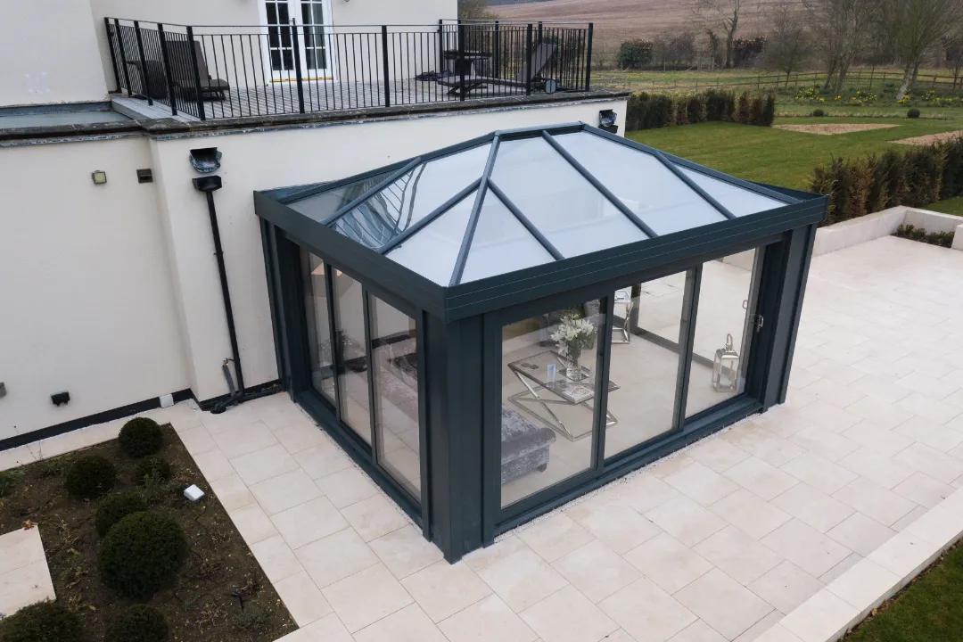 Black orangery with sliding doors
