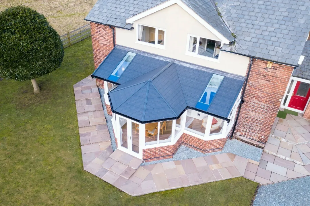 T-shaped conservatory with tiled roof