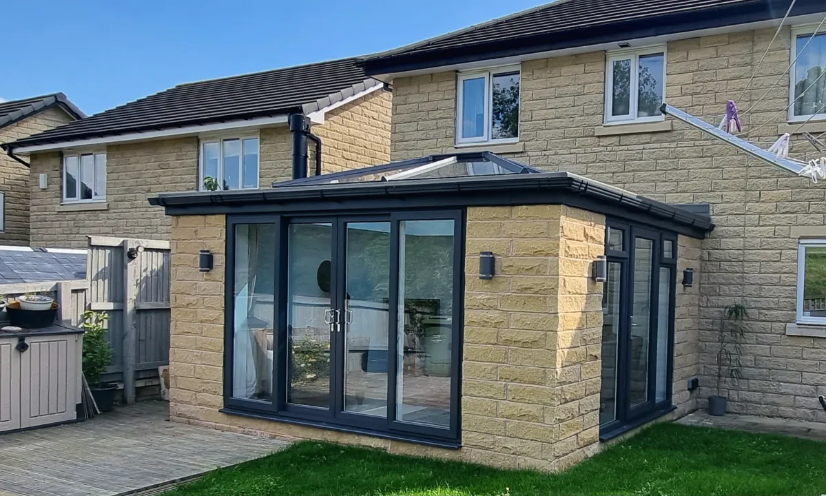 Black sliding doors for orangery